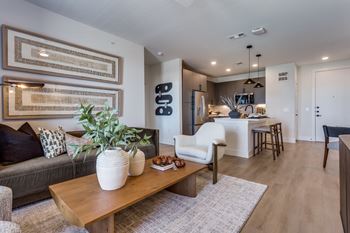 Wood-style flooring in living, dining, and bath areas